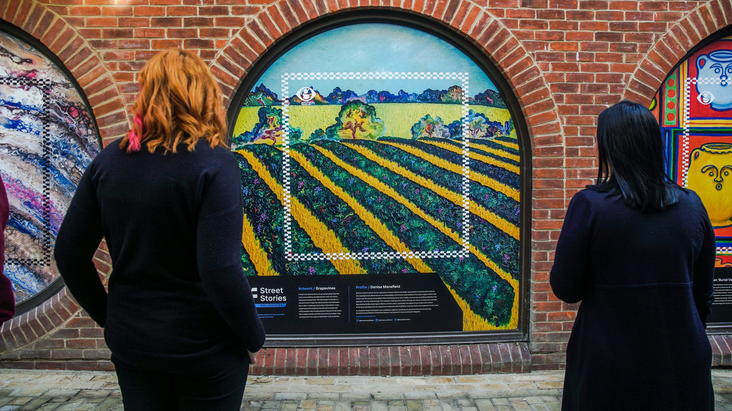 Denisa Mansfield's painting installed in a bank window to improve the city of Colchester